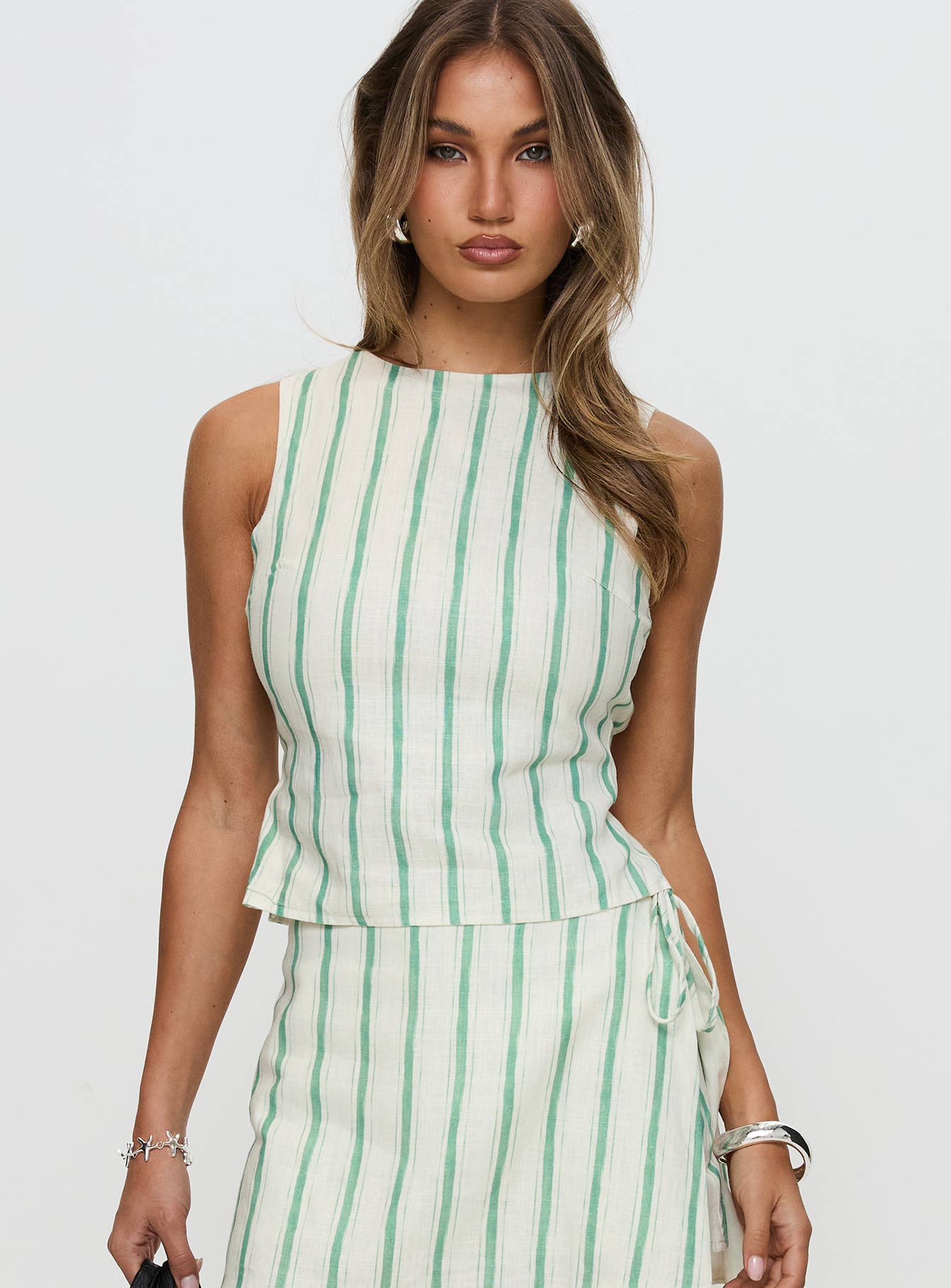 front view of model wearing Princess Polly Penelopie Backless Top Green Stripe Sleeveless Crew Neck 
