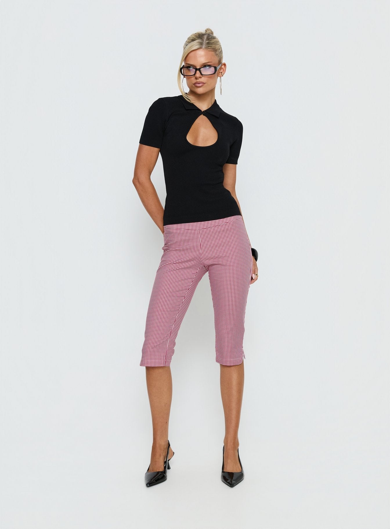 front view of model wearing Princess Polly Rossie Capri Pants Red Gingham Mid Rise Pants 