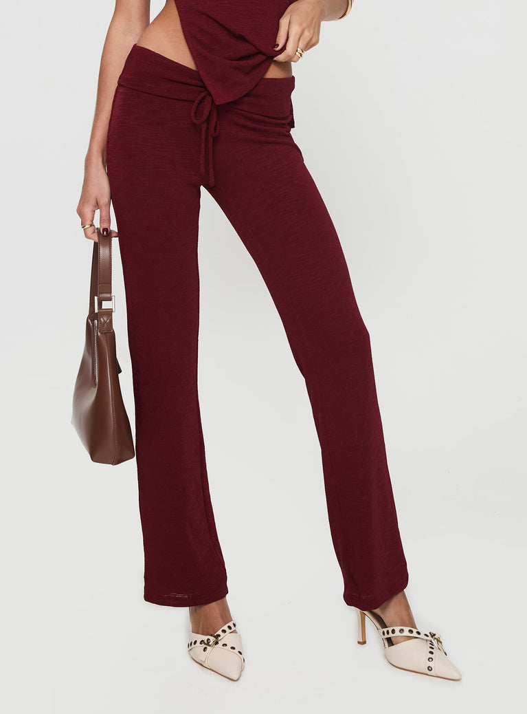 Knit pants Fold waistband, straight leg, slightly flared cuff, drawstring tie details on waist Good stretch, lined Princess Polly Lower Impact