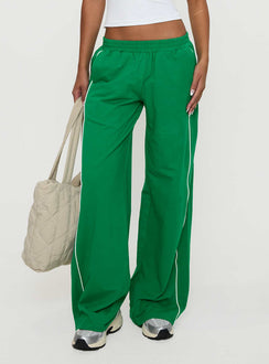 back view of model wearing Princess Polly Field Day Track Pants Green High Waisted Pants 