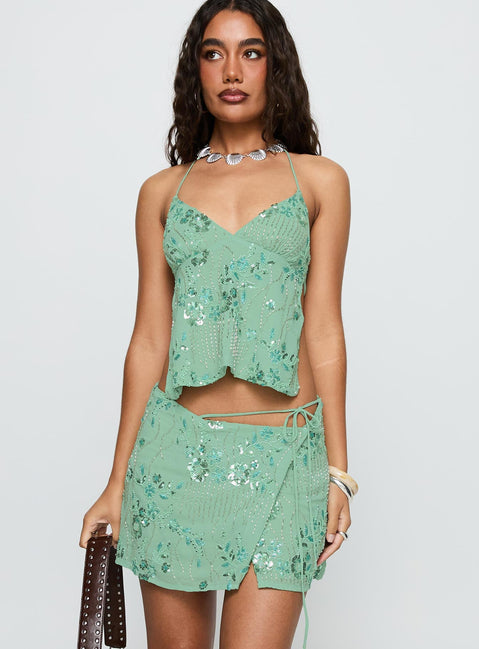   side view of model wearing Princess Polly What A Coincidence Beaded Mini Skirt Teal Mini Skirts 