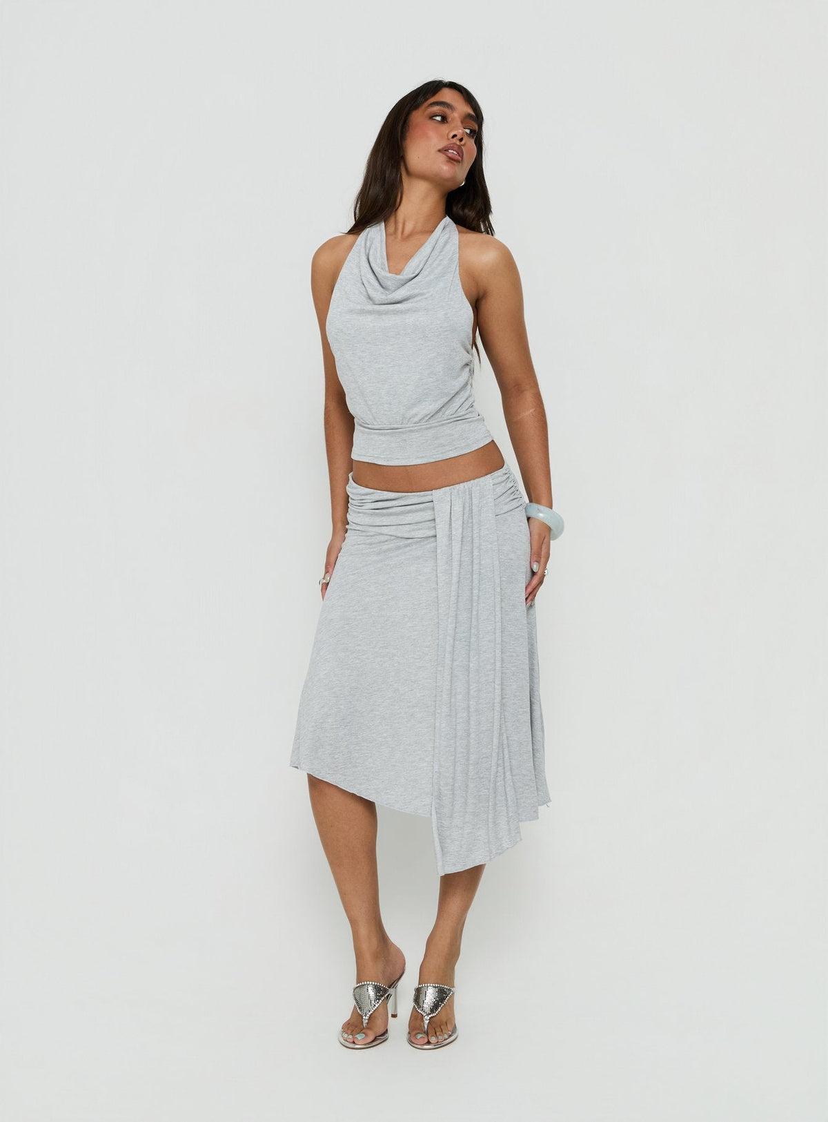 Showcasing the Iselda Draped Midi Skirt Grey Marle in womens-skirts with wrap detail and relaxed fit front view of model wearing Princess Polly