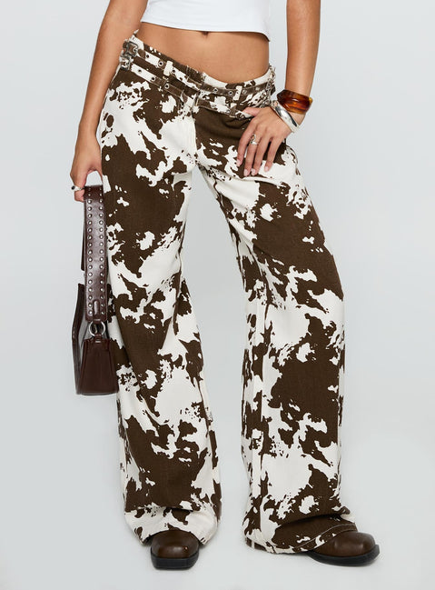 back view of model wearing Princess Polly Baccarat Belted Pant Cow Print Low Rise Jeans 
