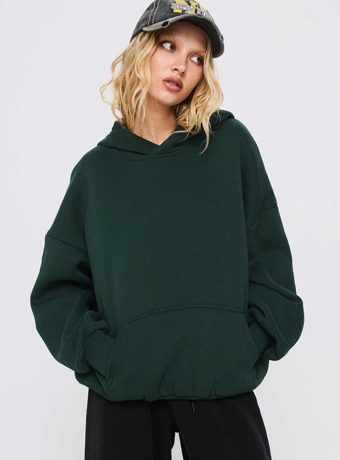 front view of model wearing Princess Polly Good Luck Graphic Hoodie Green / Blue Long 