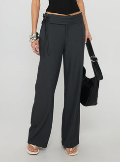 back view of model wearing Princess Polly Good Riddance Pleat Tie Slouch Pants Charcoal Low Rise Pants 