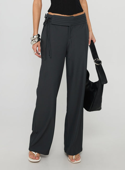 back view of model wearing Princess Polly Good Riddance Pleat Tie Slouch Pants Charcoal Low Rise Pants 