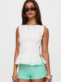 side view of model wearing Princess Polly Read My Soul Bead Detail Top White Sleeveless Boat Neck 