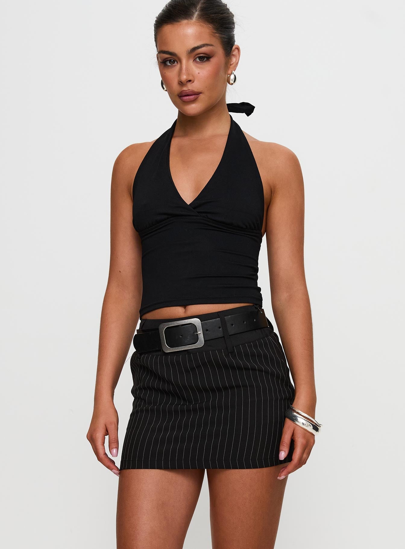 back view of model wearing Princess Polly Christel Pinstripe Skort Black Mini Skirts 