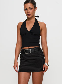 back view of model wearing Princess Polly Christel Pinstripe Skort Black Mini Skirts 