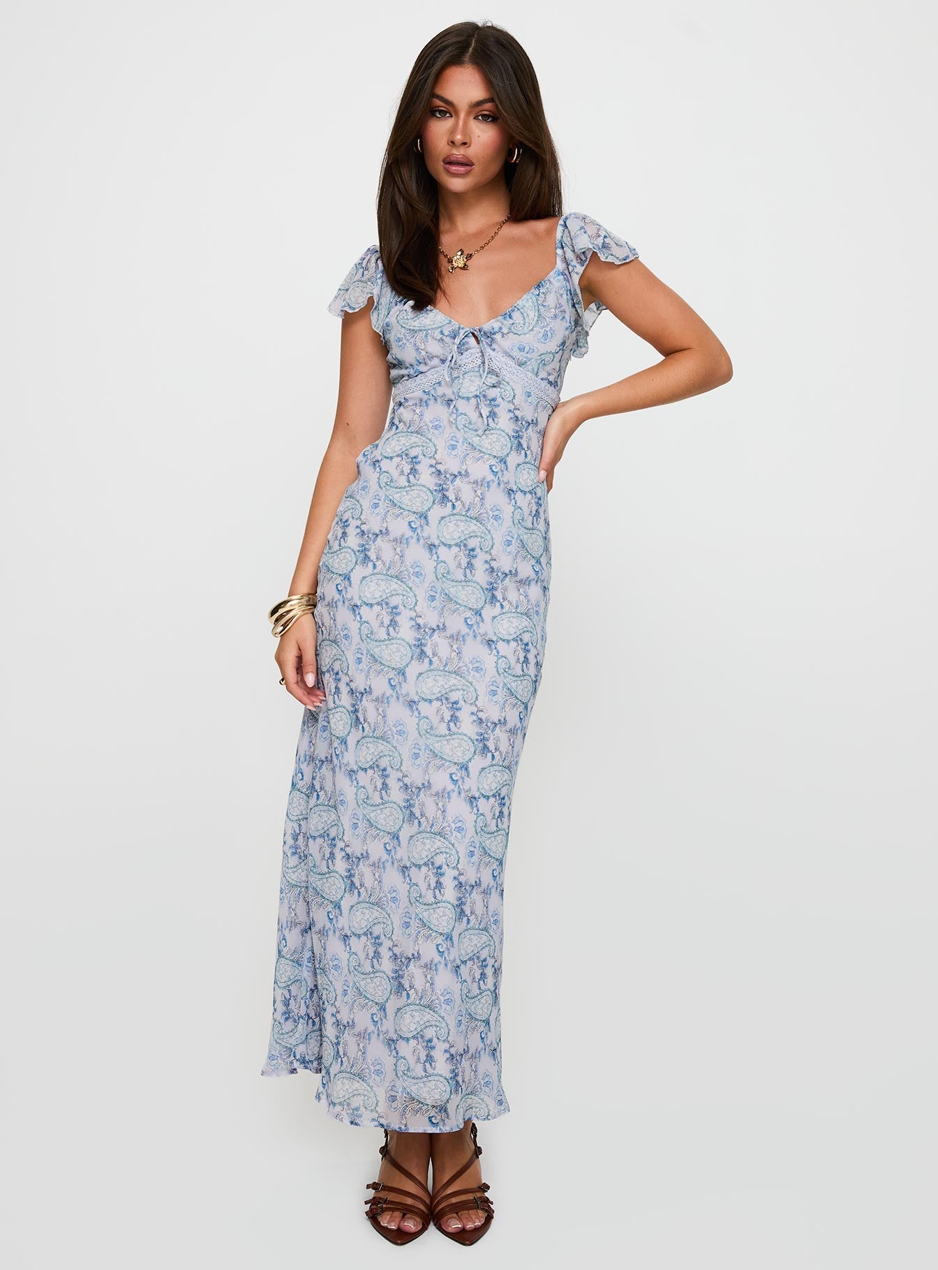 front view of model wearing Princess Polly Dahleia Maxi Dress Blue Paisley V-Neck 