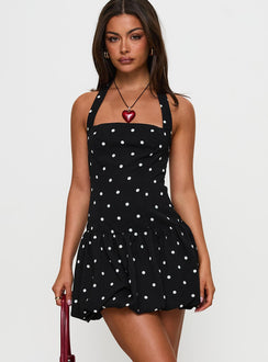 front view of model wearing Princess Polly Gigli Bubble Hem Mini Dress Polka Dot Square Neck 