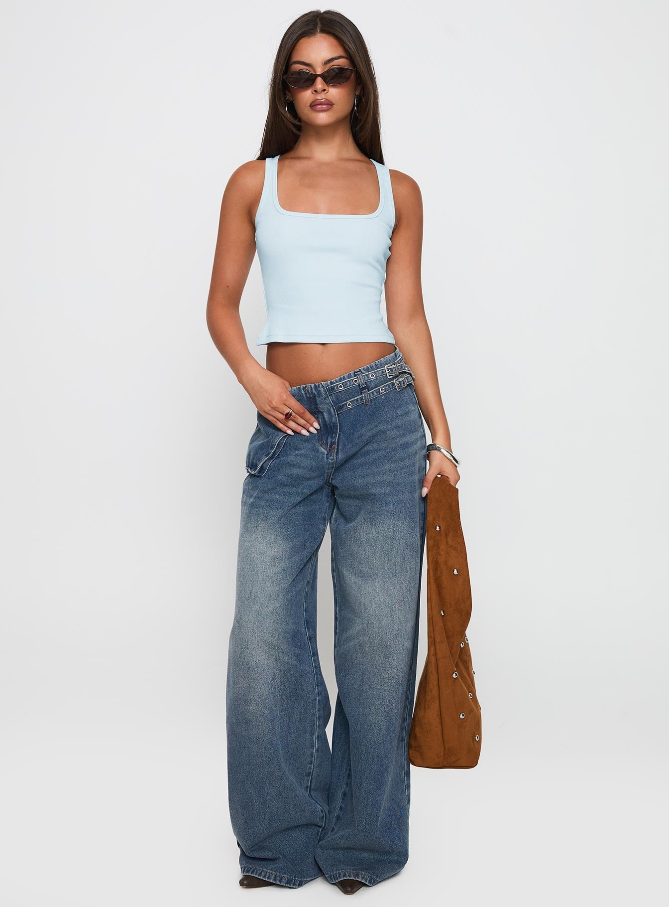 front view of model wearing Princess Polly Paltrow Cargo Jeans Mid Blue Wash Mid Rise 