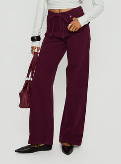 front view of model wearing Princess Polly Bruiser Tie Waist Mid Rise Wide Leg Jeans Currant High Rise Jeans Jeans 
