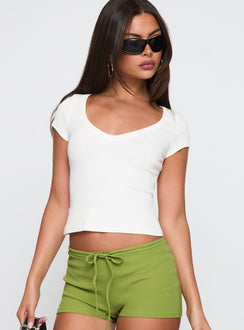 front view of model wearing Princess Polly Lovely Day V Neck Top White Short Sleeves V-Neck 