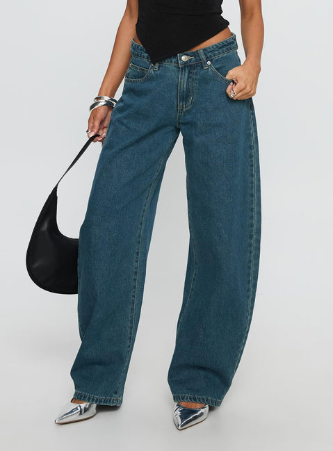front view of model wearing Princess Polly Juda Mid Rise Barrel Leg Jeans Mid Blue Wash High Waisted Jeans 
