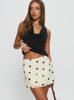   front view of model wearing Princess Polly Adelaida Ruffle Mini Skirt Cream Polka Mini Skirts 