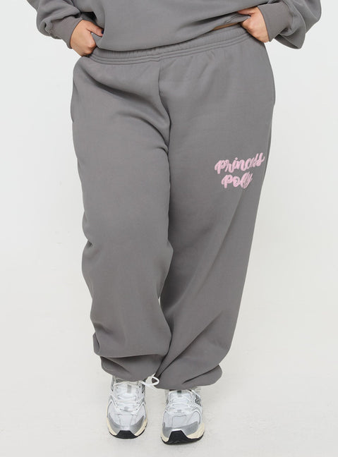 side view of model wearing Princess Polly Princess Polly Track Pants Puff Text Charcoal Curve 
