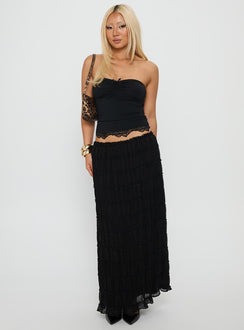   side view of model wearing Princess Polly Estefania Maxi Skirt Black Maxi 