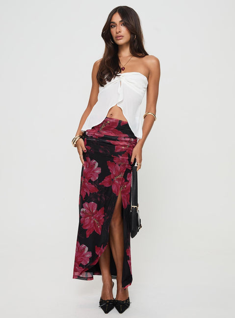 back view of model wearing Princess Polly Cooperi Maxi Skirt Black / Red Floral Maxi 