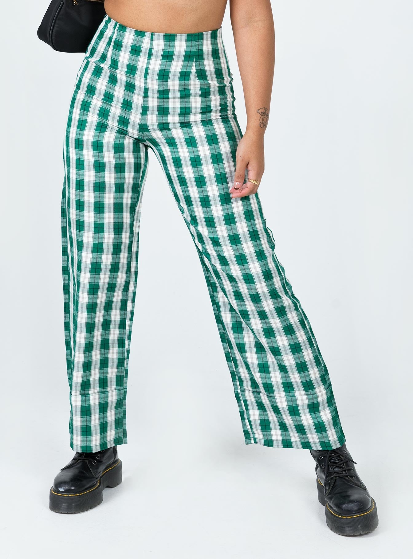 front view of model wearing Princess Polly Euros Pants Green Tartan 