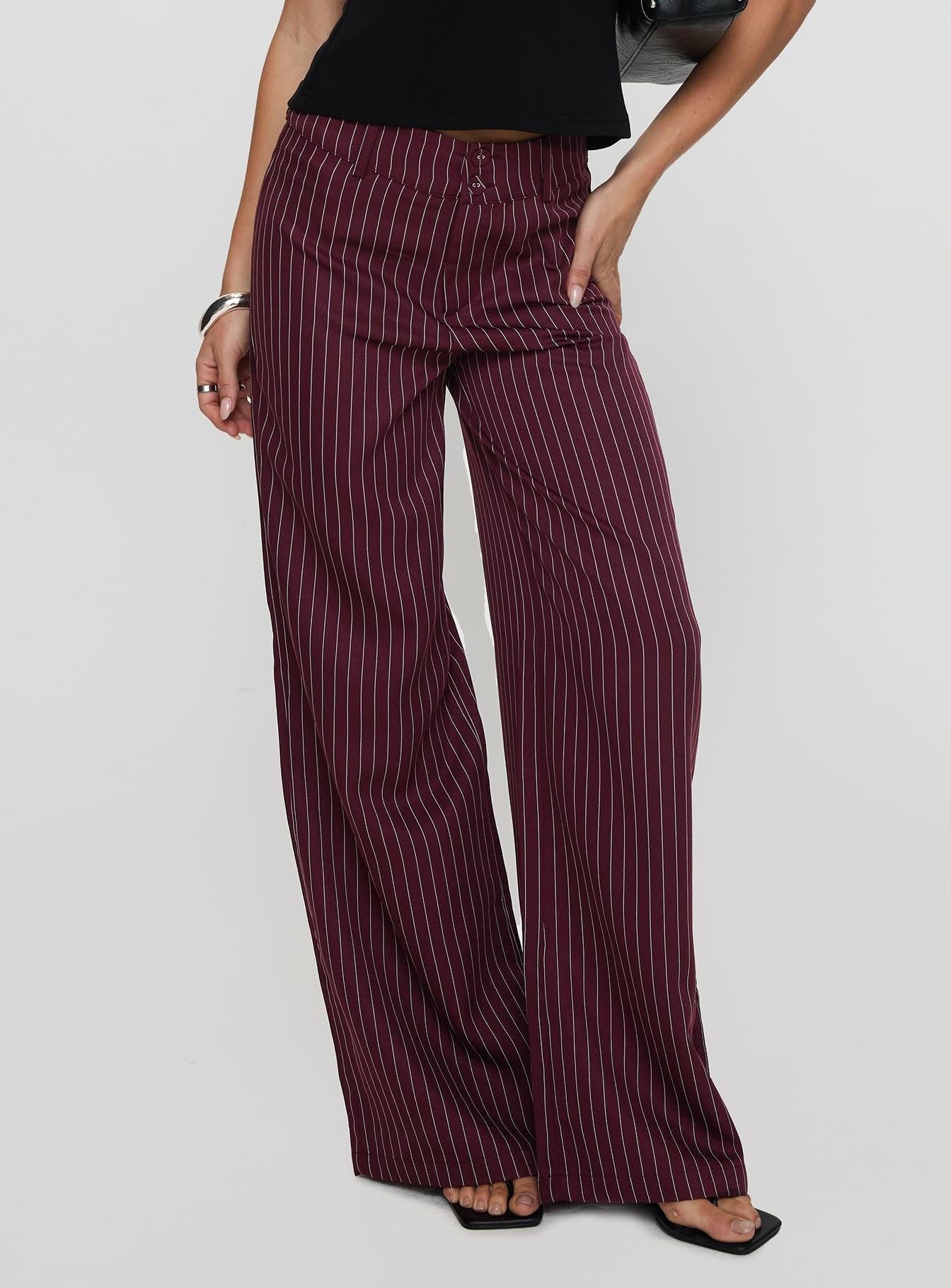 back view of model wearing Princess Polly Lorenne Mid Rise Pant Burgundy Pinstripe High Waisted Pants 