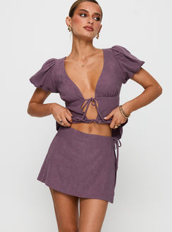 front view of model wearing Princess Polly Gulliver Tie Side Mini Skort Mauve High Waisted Shorts 