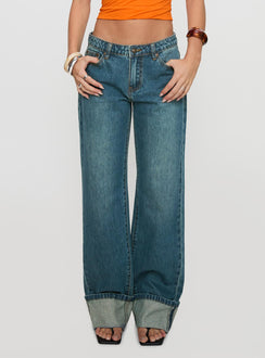 front view of model wearing Princess Polly Toros Mid Rise Wide Leg Foldover Denim Jeans Mid Blue Low Rise Jeans 