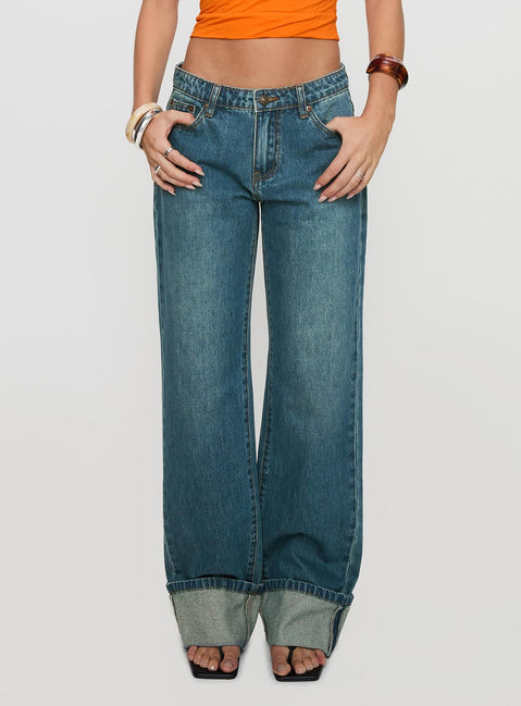 front view of model wearing Princess Polly Toros Mid Rise Wide Leg Foldover Denim Jeans Mid Blue Low Rise Jeans 