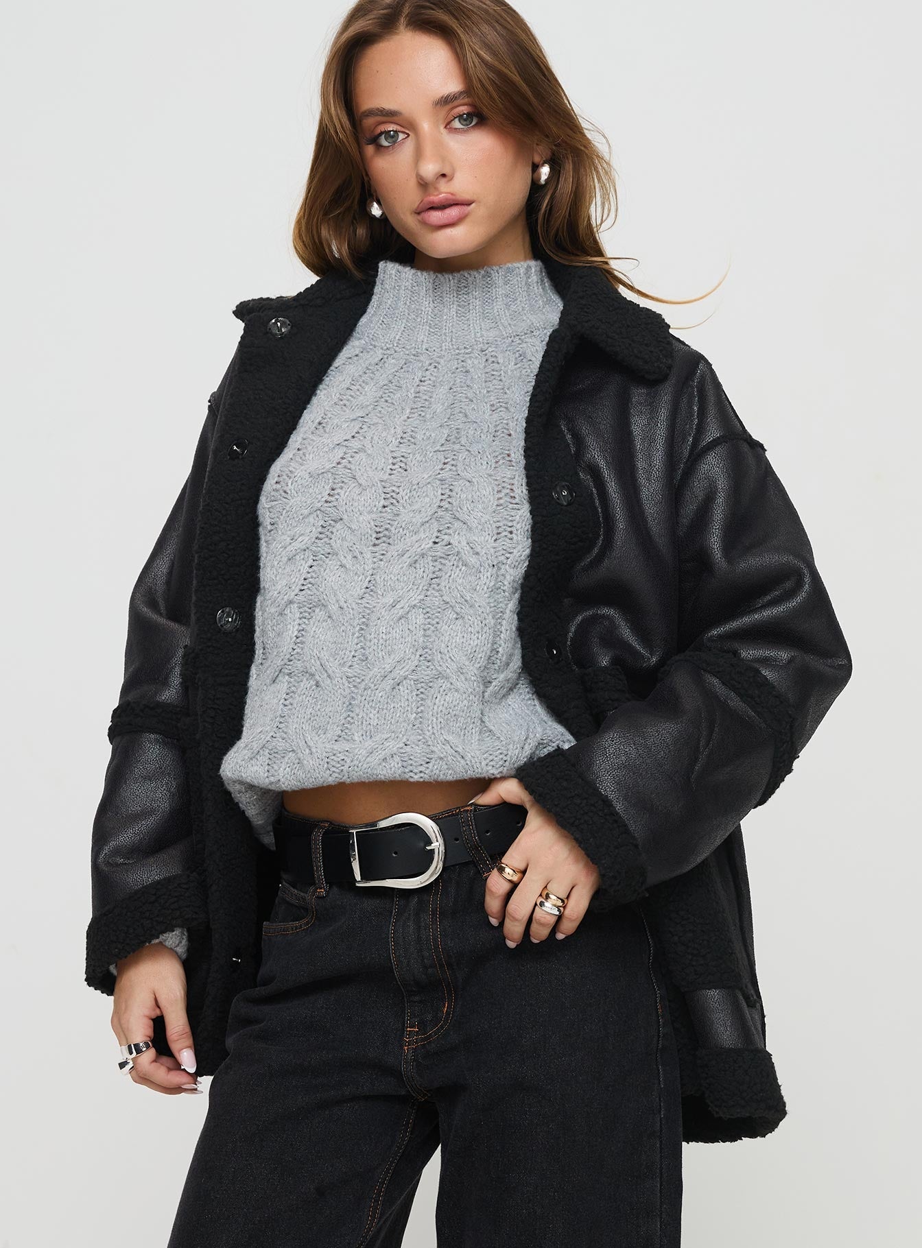 Faux leather jacket  Oversized fit, classic collar, press button fastening, twin hip pockets Non-stretch material, shearling lining