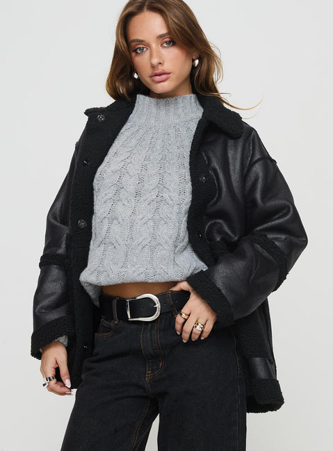 Faux leather jacket  Oversized fit, classic collar, press button fastening, twin hip pockets Non-stretch material, shearling lining