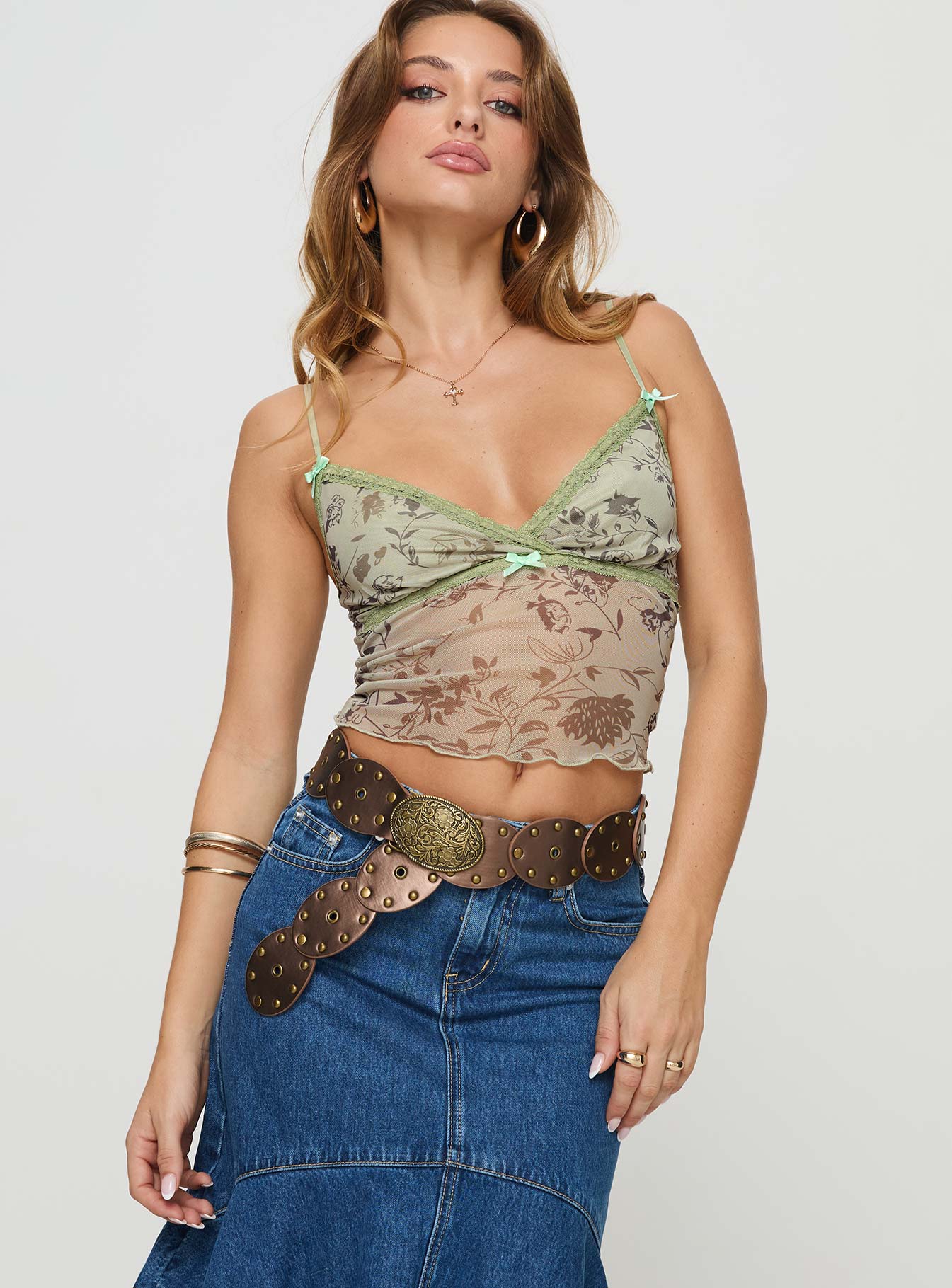 front view of model wearing Princess Polly Shepherd Top Brown Sleeveless Plunger 