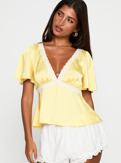 front view of model wearing Princess Polly For The Summer Lace Trim Top Yellow Short Sleeves Plunger 