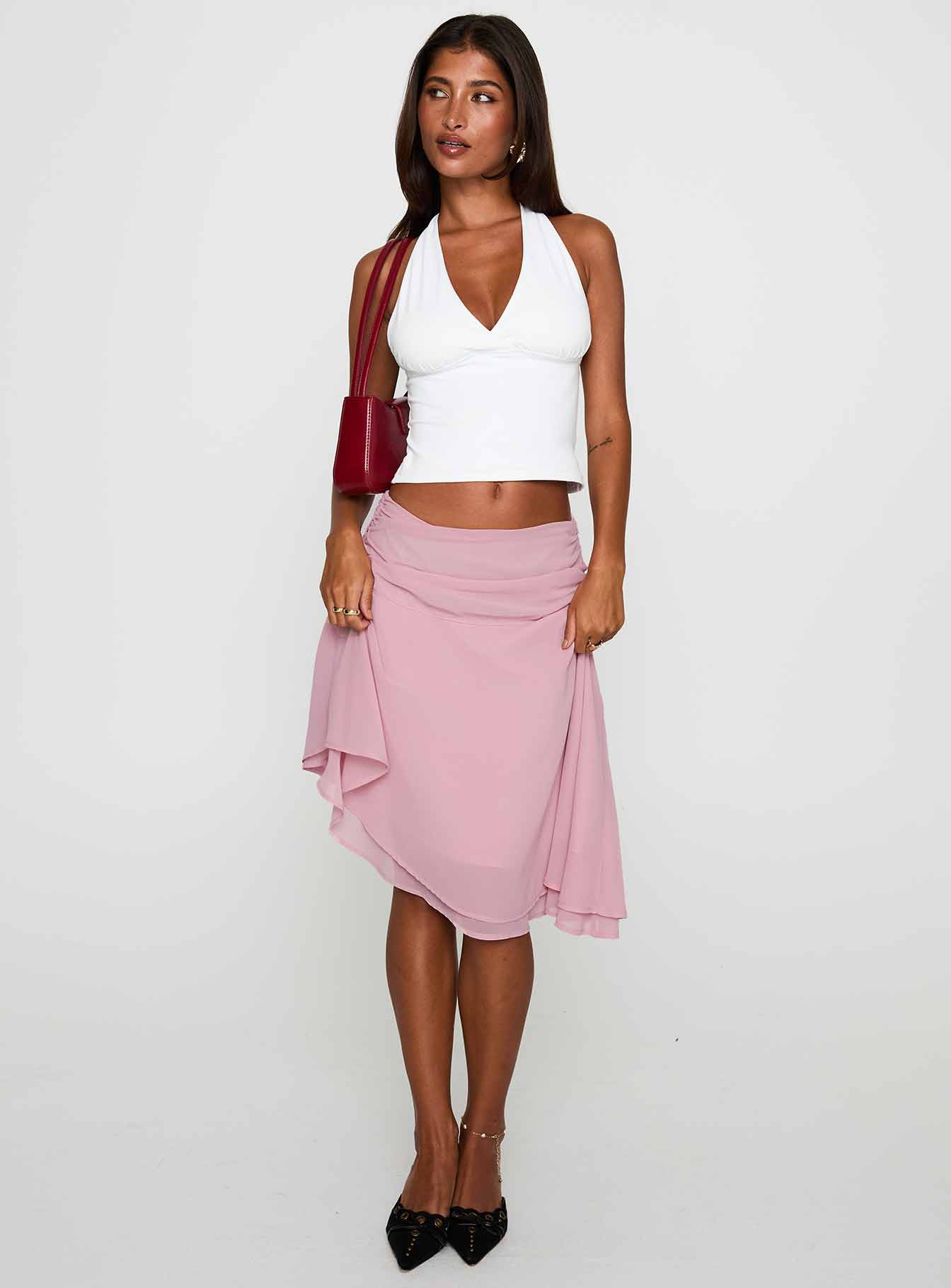   front view of model wearing Princess Polly Evanescence Asymmetrical Midi Skirt Pastel Pink Midi Skirts 