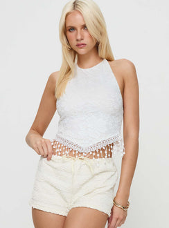 front view of model wearing Princess Polly Isolene Top White Sleeveless Crew Neck 