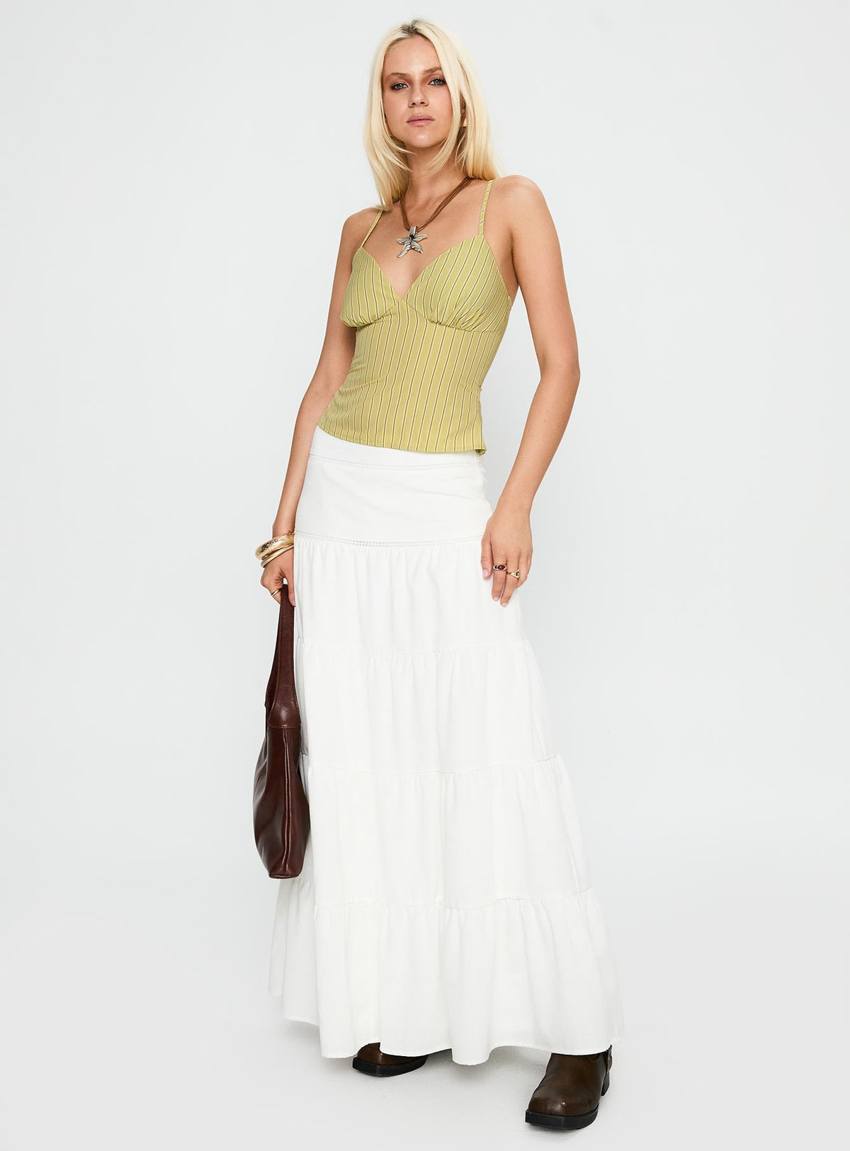   side view of model wearing Princess Polly Snowy River Tiered Maxi Skirt White Maxi Skirts Skirts 