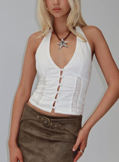front view of model wearing Princess Polly Vayda Halter Top White Sleeveless Plunger 