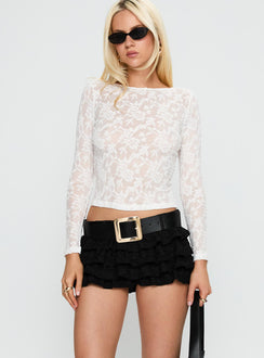 back view of model wearing Princess Polly Match Point Mini Skort Onyx Low Rise Shorts 