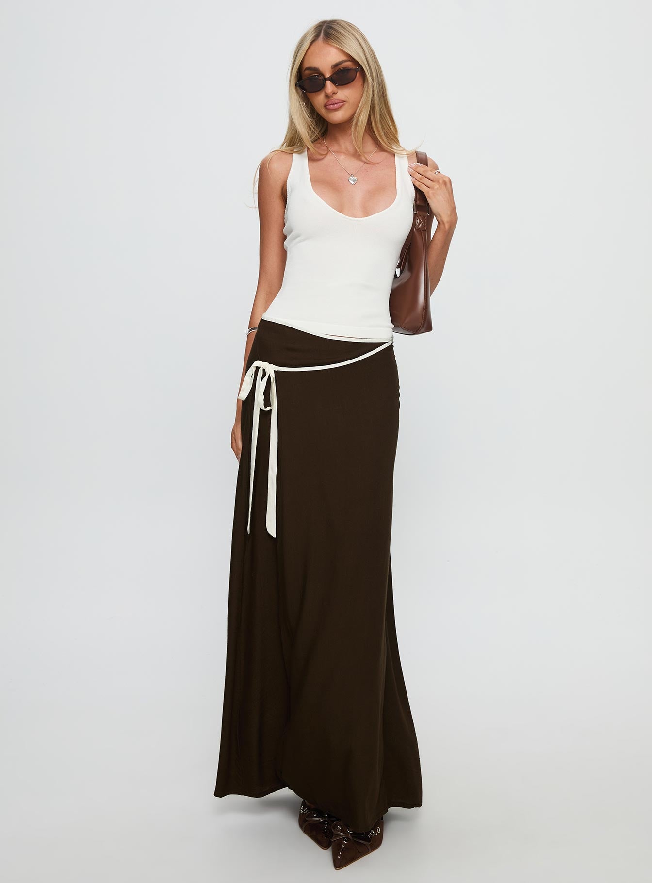   side view of model wearing Princess Polly Keirah Contrast Wrap Maxi Skirt Chocolate / White Maxi 