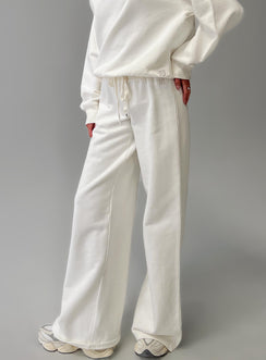 back view of model wearing Princess Polly Dodie Wide Leg Pants Washed White High Rise Pants 