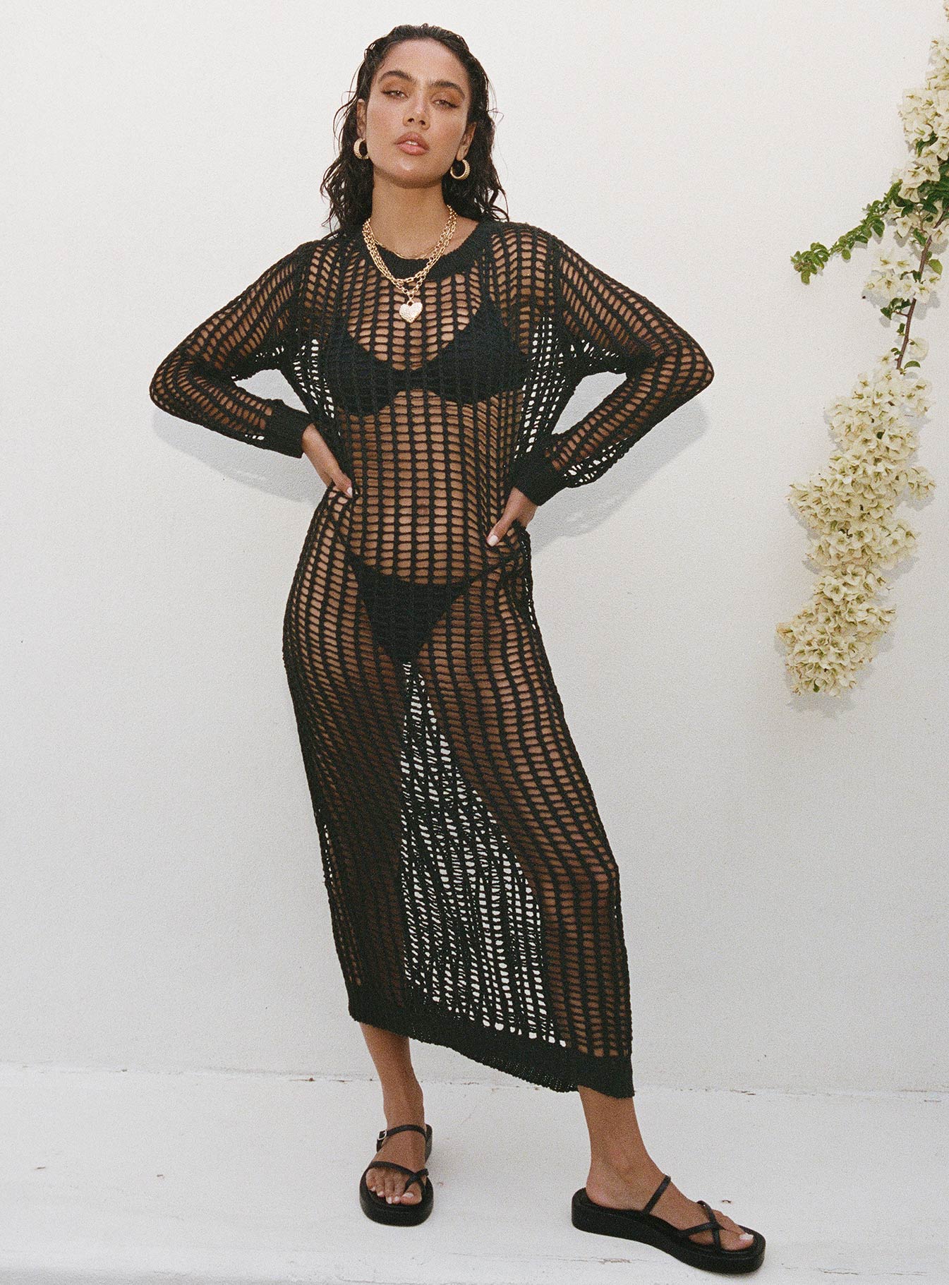 Black Long sleeve maxi dress Crochet knit sheer material, crew neckline, ribbed cuffs and hem
