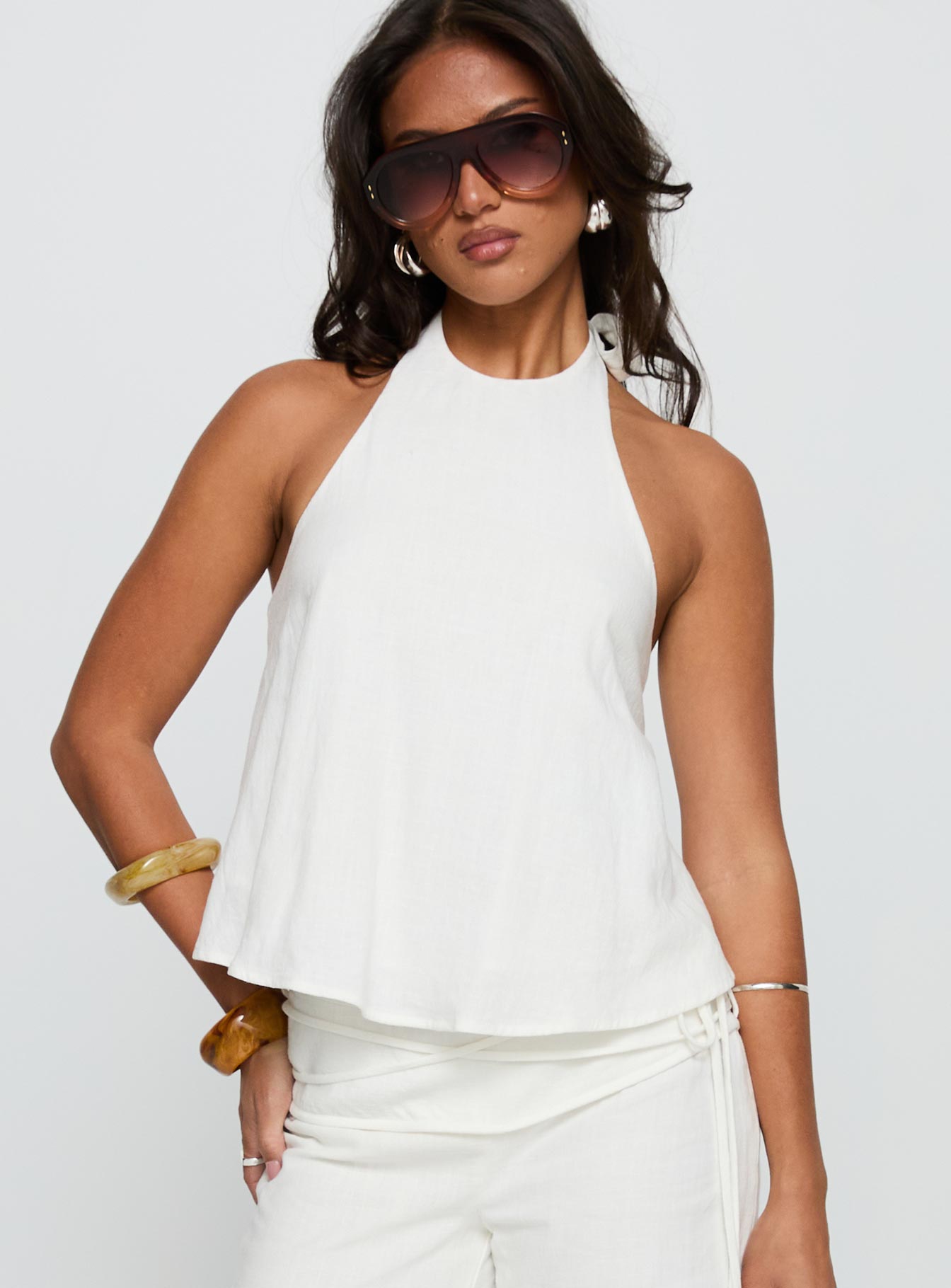 front view of model wearing Princess Polly Aquaria Halter Linen Blend Top White Sleeveless Crew Neck 