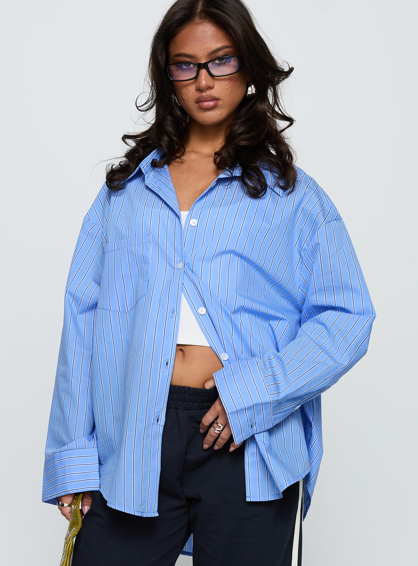 front view of model wearing Princess Polly Kodhi Oversized Long Sleeve Top Blue Stripe Full Sleeves V-Neck 