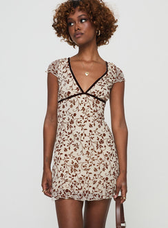 front view of model wearing Princess Polly Melva Mini Dress Stem Flower Brown Plunger 