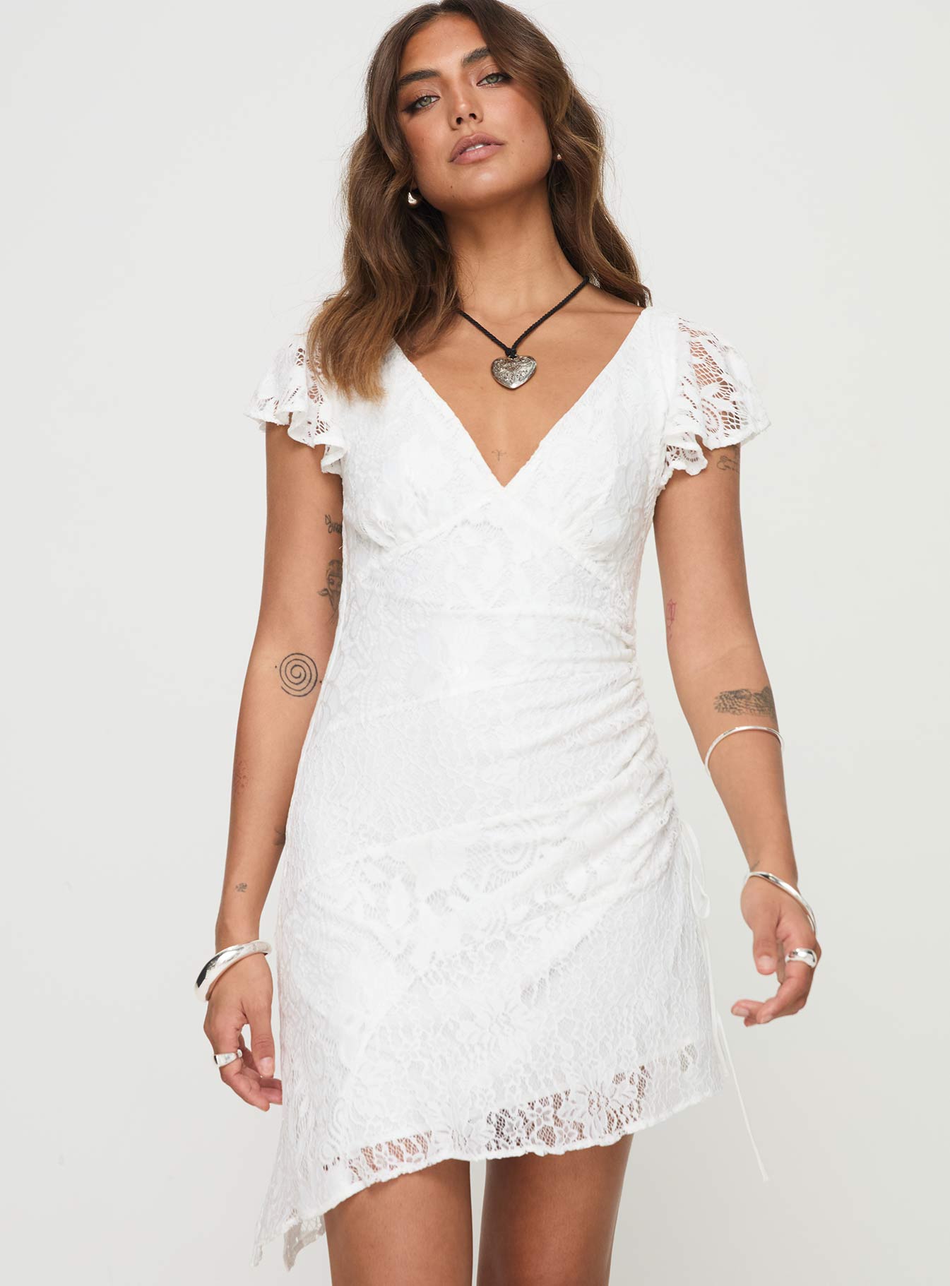 front view of model wearing Princess Polly Ramallo Lace Mini Dress White V-Neck 