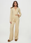 Matching rib-knit set Long sleeve top, classic collar, button fastening at front High-rise pants, thick elasticated waistband, wide leg Good stretch, unlined
