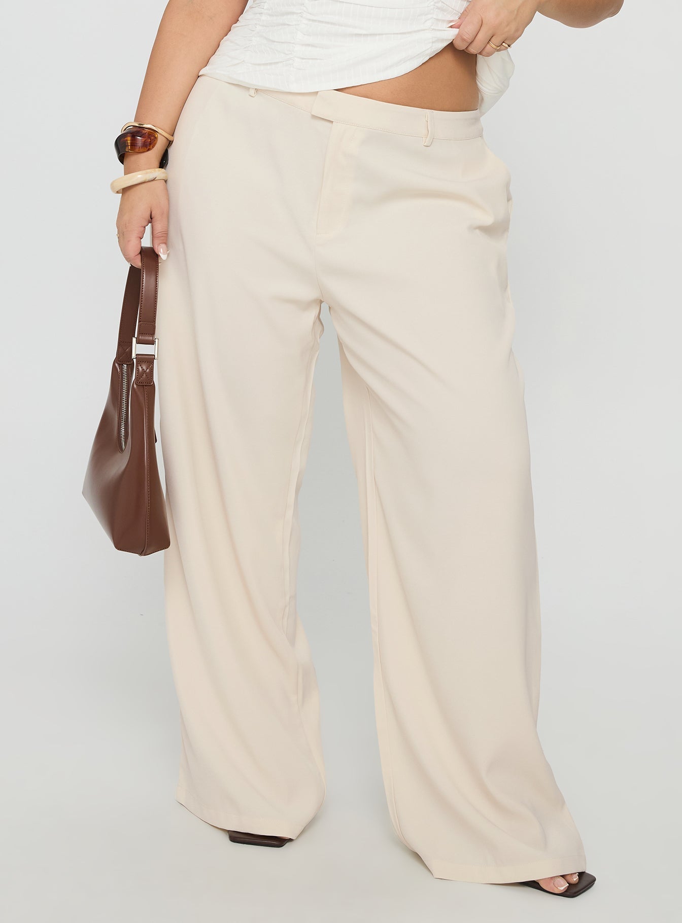 back view of model wearing Princess Polly Irresistible Wide Leg Pant Cream Curve High Waisted Pants 