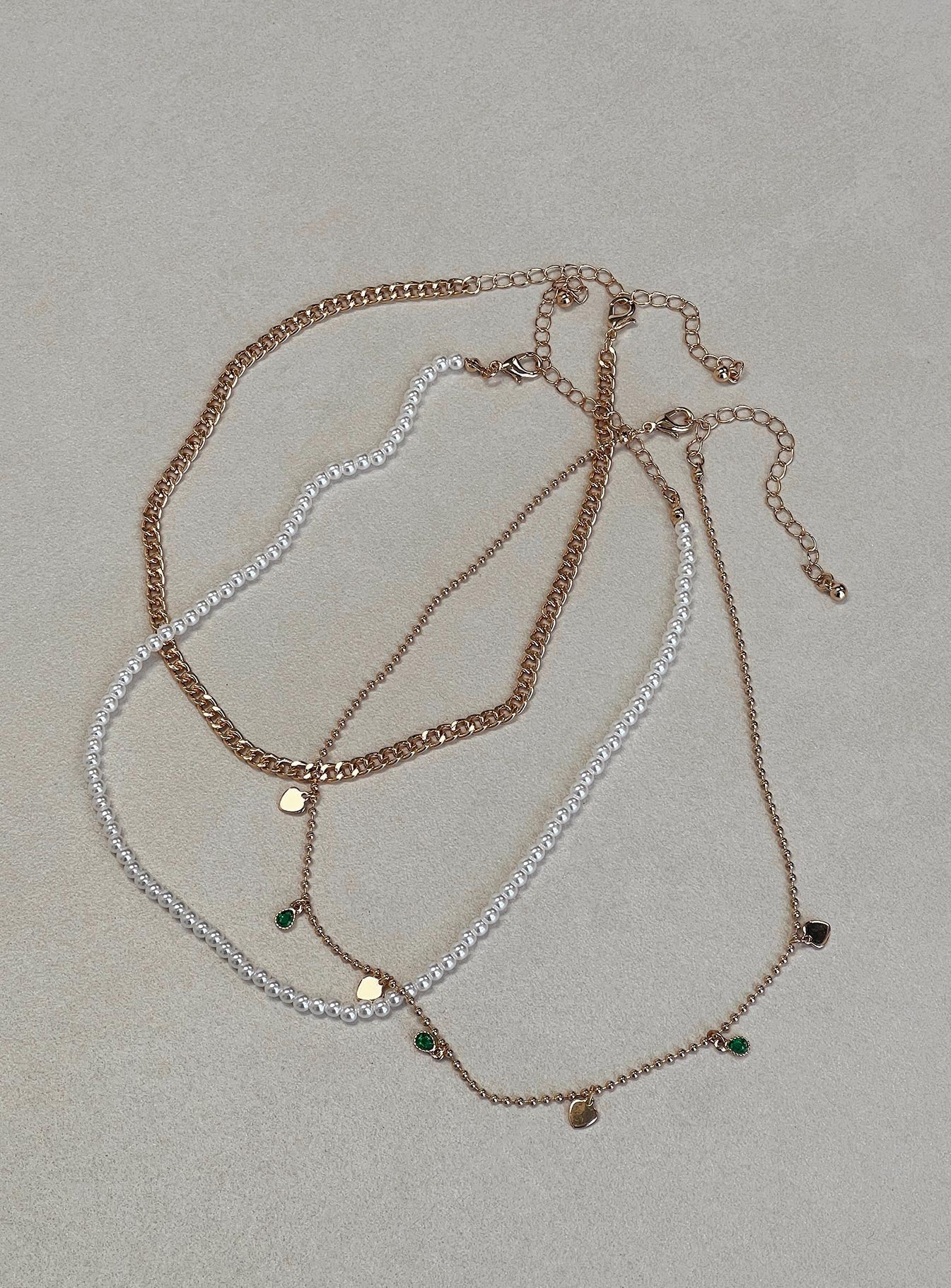 Necklace Gold toned Three chains - these can be worn separately Pearl and gemstone detail Lobster clasp fastening Adjustable lengths