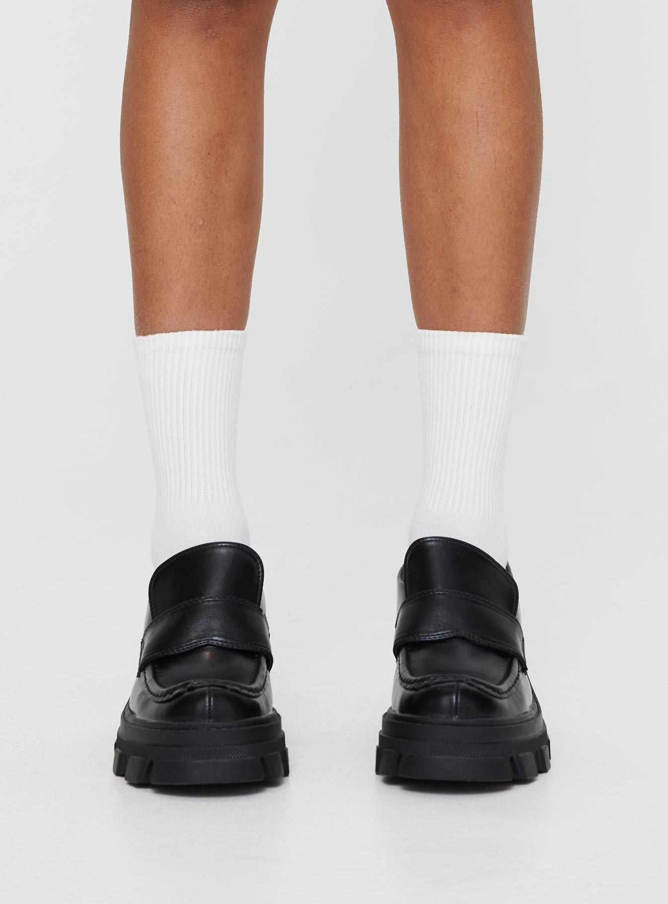 Faux leather loafer Rounded toe, platform base, padded footbed, treaded sole