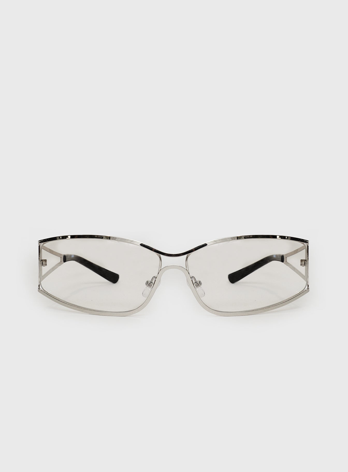 Silver-toned sunglasses Metal frame, silver tinted lenses, silicone nose pads, thick temples, black detail tip temples
