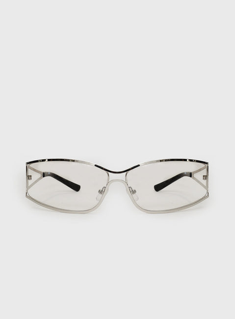 Silver-toned sunglasses Metal frame, silver tinted lenses, silicone nose pads, thick temples, black detail tip temples